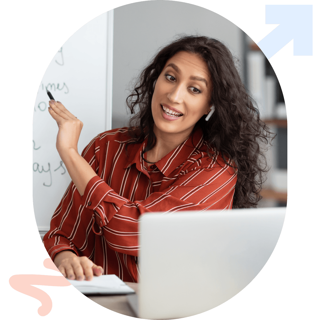 Image of a tutor working with a student on a laptop